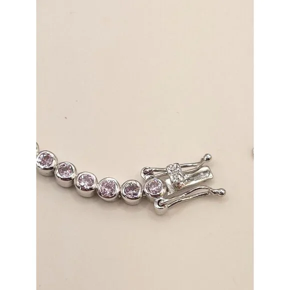 Silver Tone Tennis Bracelet With Pink CZ Stones & Secure Clasp - Picture 10 of 11